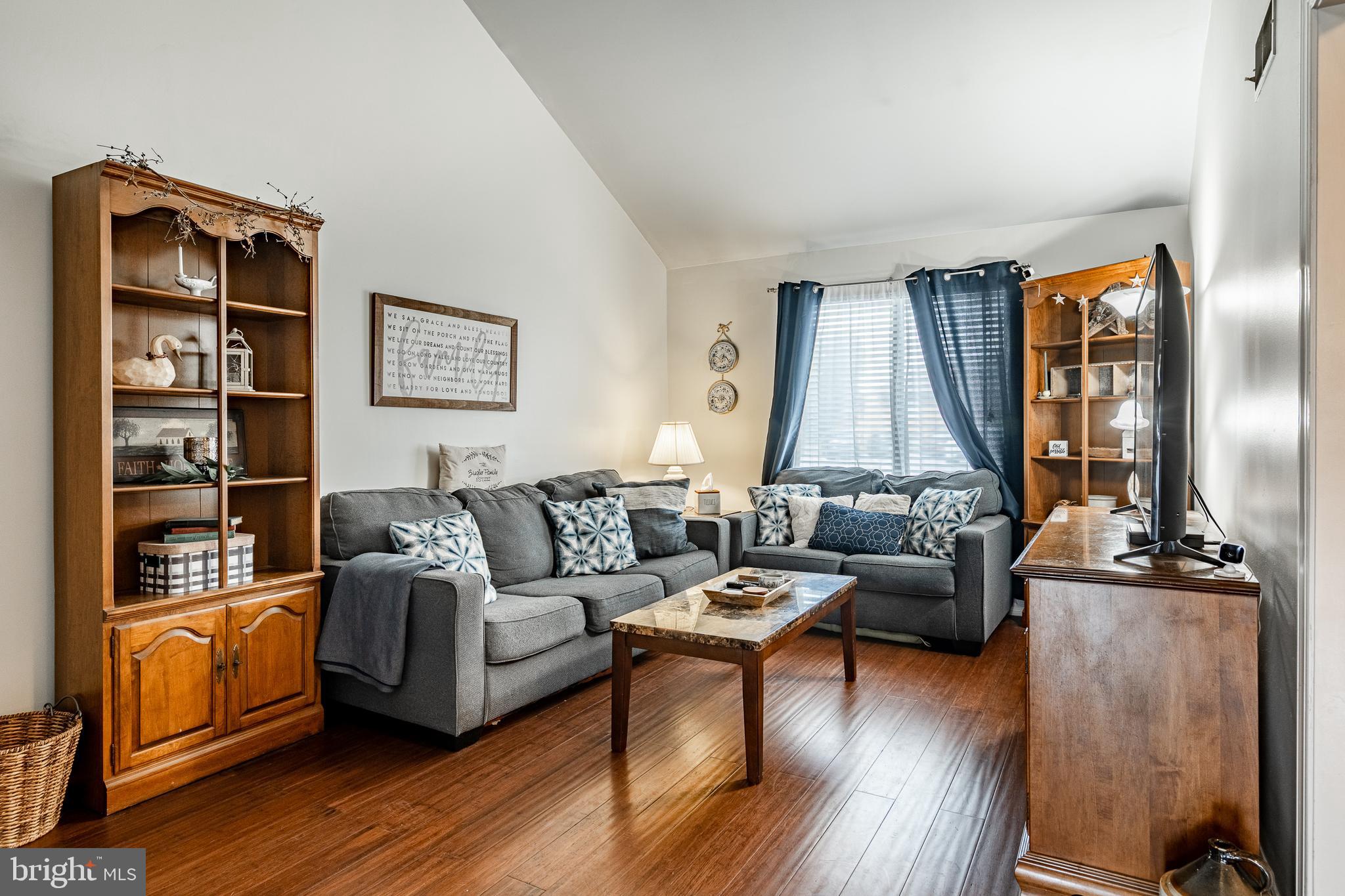 32-4 Wister Way Reading, PA 19606 - Photo 8 of 47 a living room with furniture and wooden floor