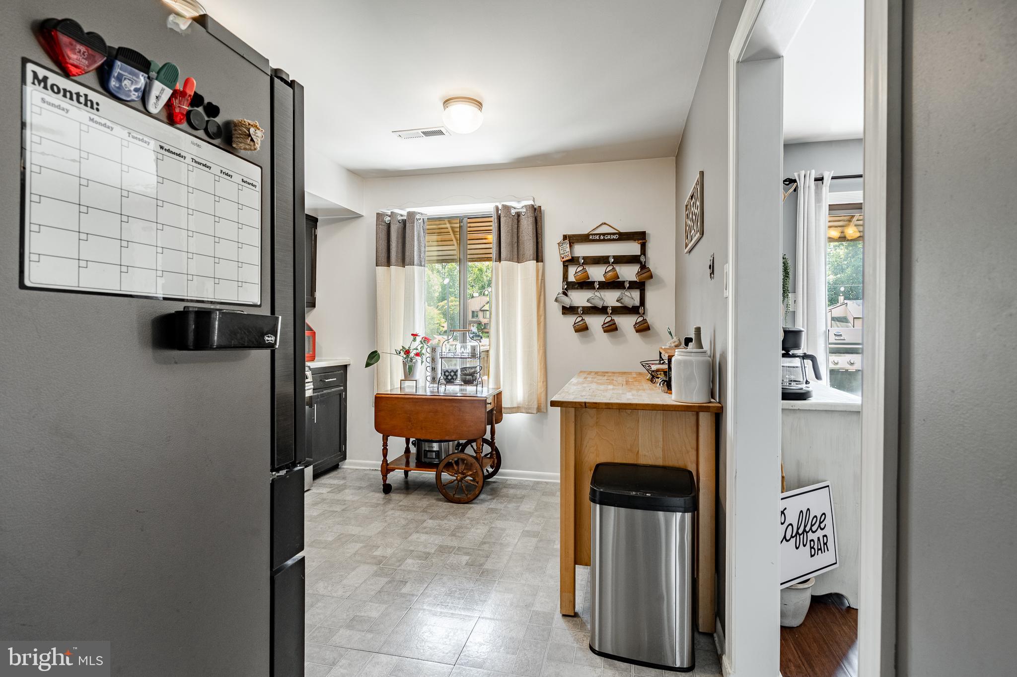 32-4 Wister Way Reading, PA 19606 - Photo 10 of 47 a living room with furniture and a window