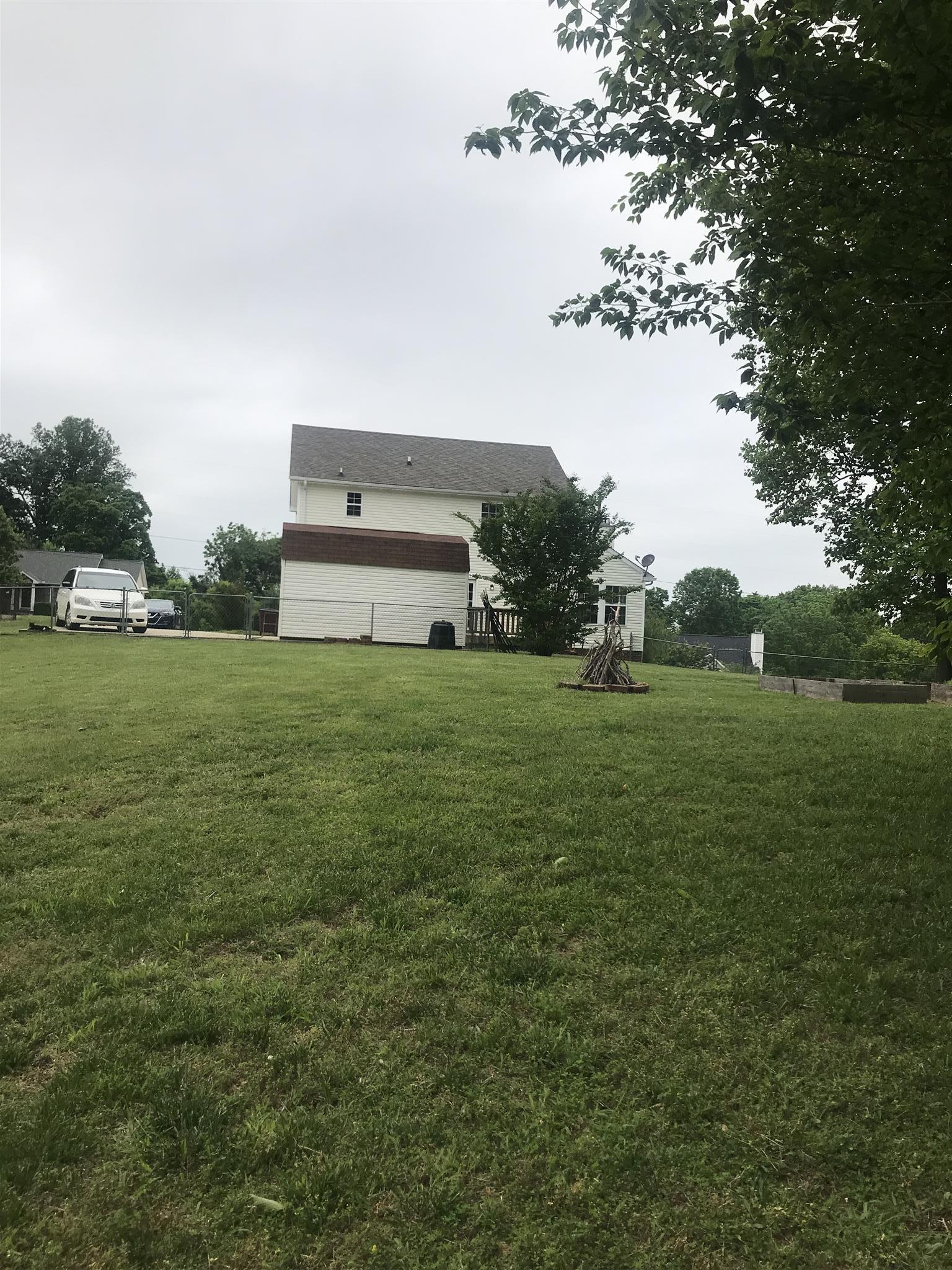 1037 Heatherwood Road Pleasant View, TN 37146 - Photo 12 of 28 back yard