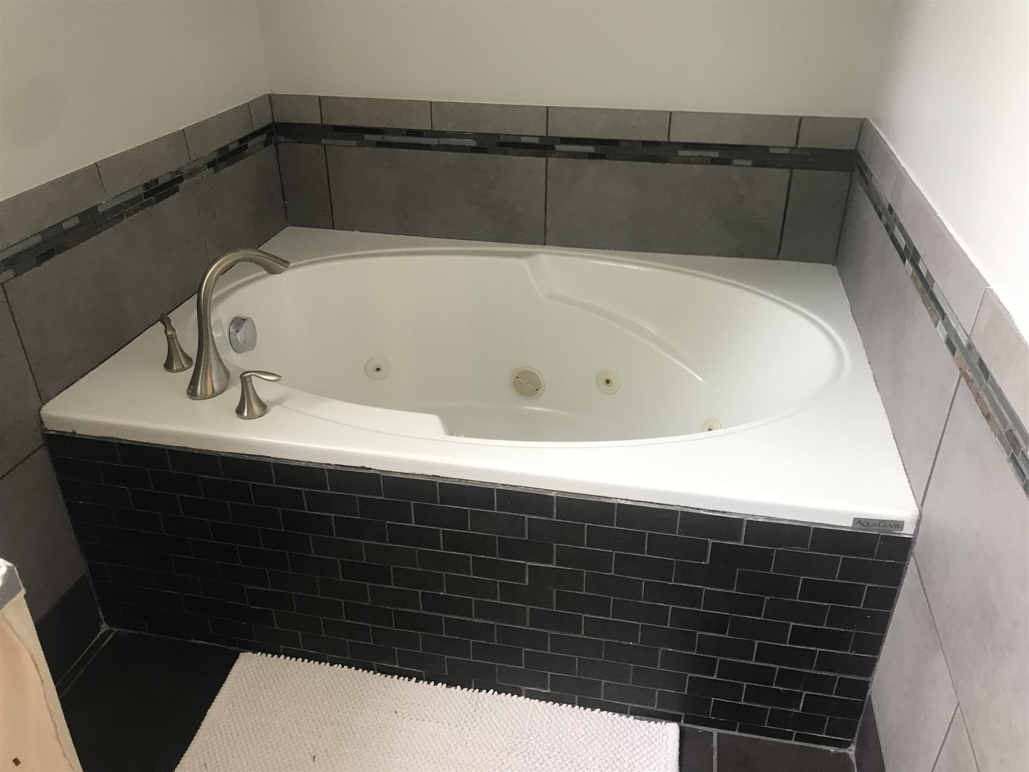 1037 Heatherwood Road Pleasant View, TN 37146 - Photo 2 of 28 Custom Tile around master tub