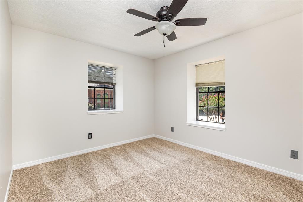 6029 Buffridge Trail Dallas, TX 75252 - Photo 24 of 30 a view of an empty room with a window