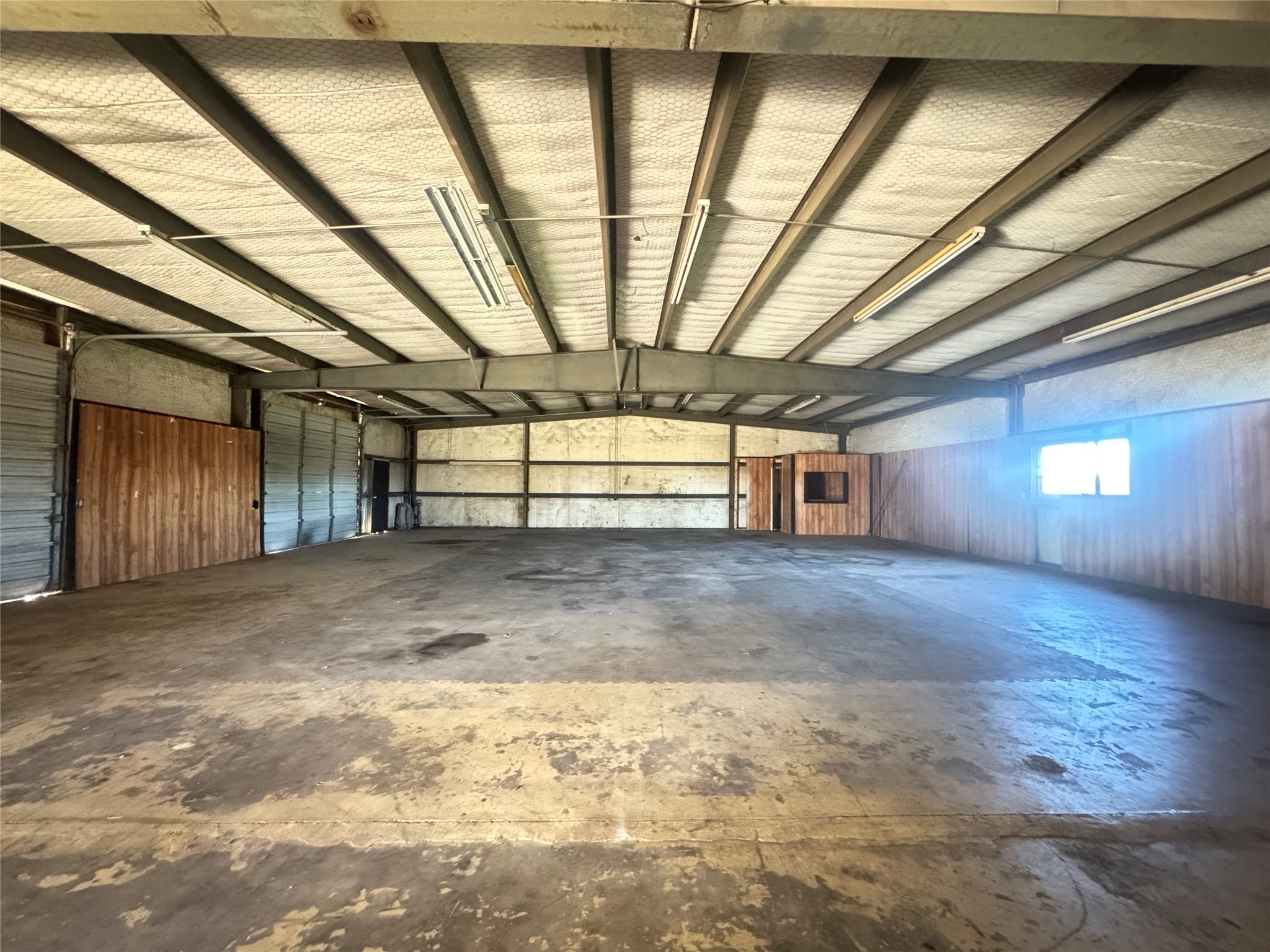 51 New Wehdem Road Brenham, TX 77833 - Photo 13 of 20 a view of empty room with windows