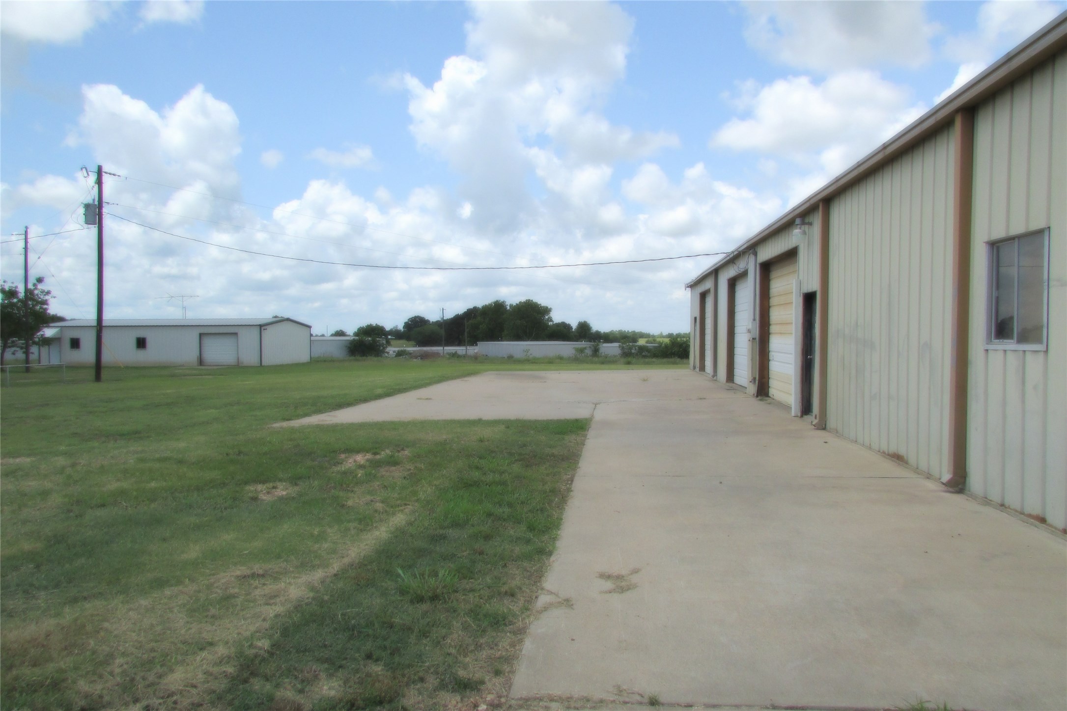 51 New Wehdem Road Brenham, TX 77833 - Photo 15 of 20 a view of a backyard of the house