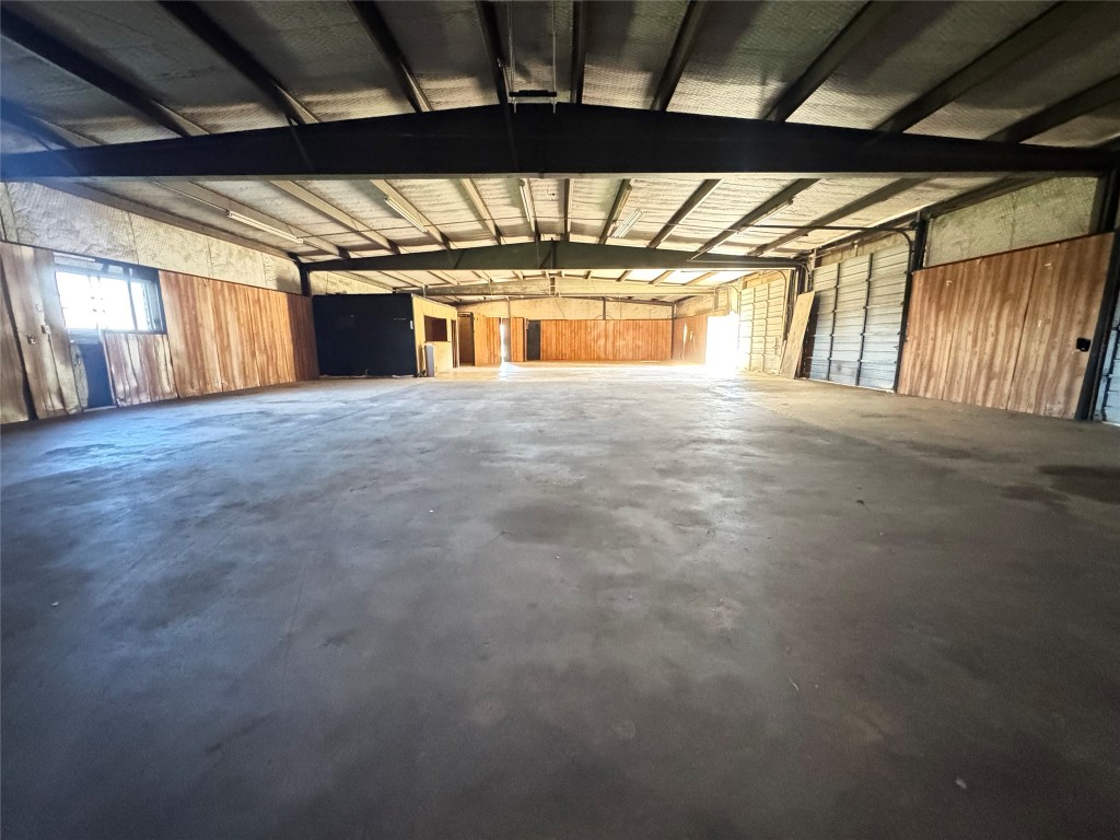51 New Wehdem Road Brenham, TX 77833 - Photo 4 of 20 a view of an empty room with a window