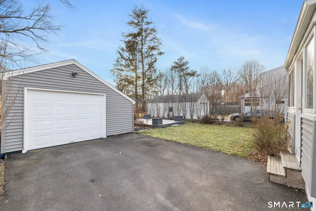 a view of a door and window in an empty room