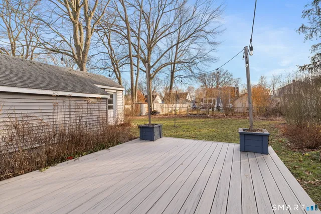 a view of kitchen with cabinets and wooden floor
