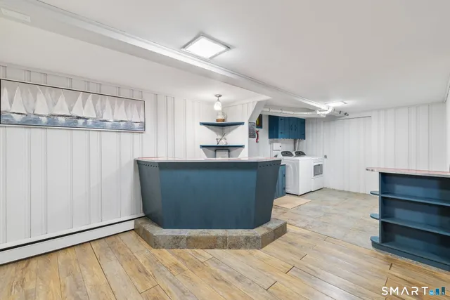 a utility room with cabinets