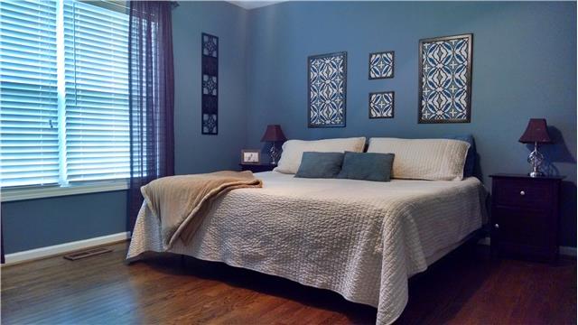 6778 Primm Springs Road Lyles, TN 37098 - Photo 11 of 20 Master Bedroom with hardwood floors & double window ~ Faux wood blinds throughout the home