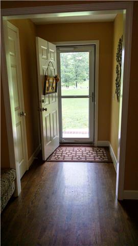 6778 Primm Springs Road Lyles, TN 37098 - Photo 5 of 20 Entry hall with coat closet and storm door