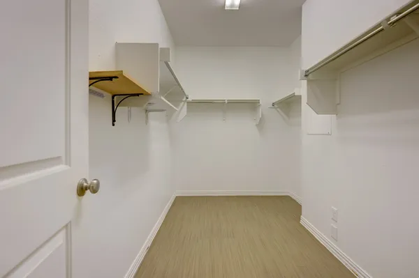 a bathroom with a sink double vanity and a mirror