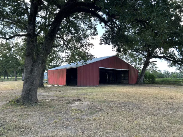 a house with trees in front of it