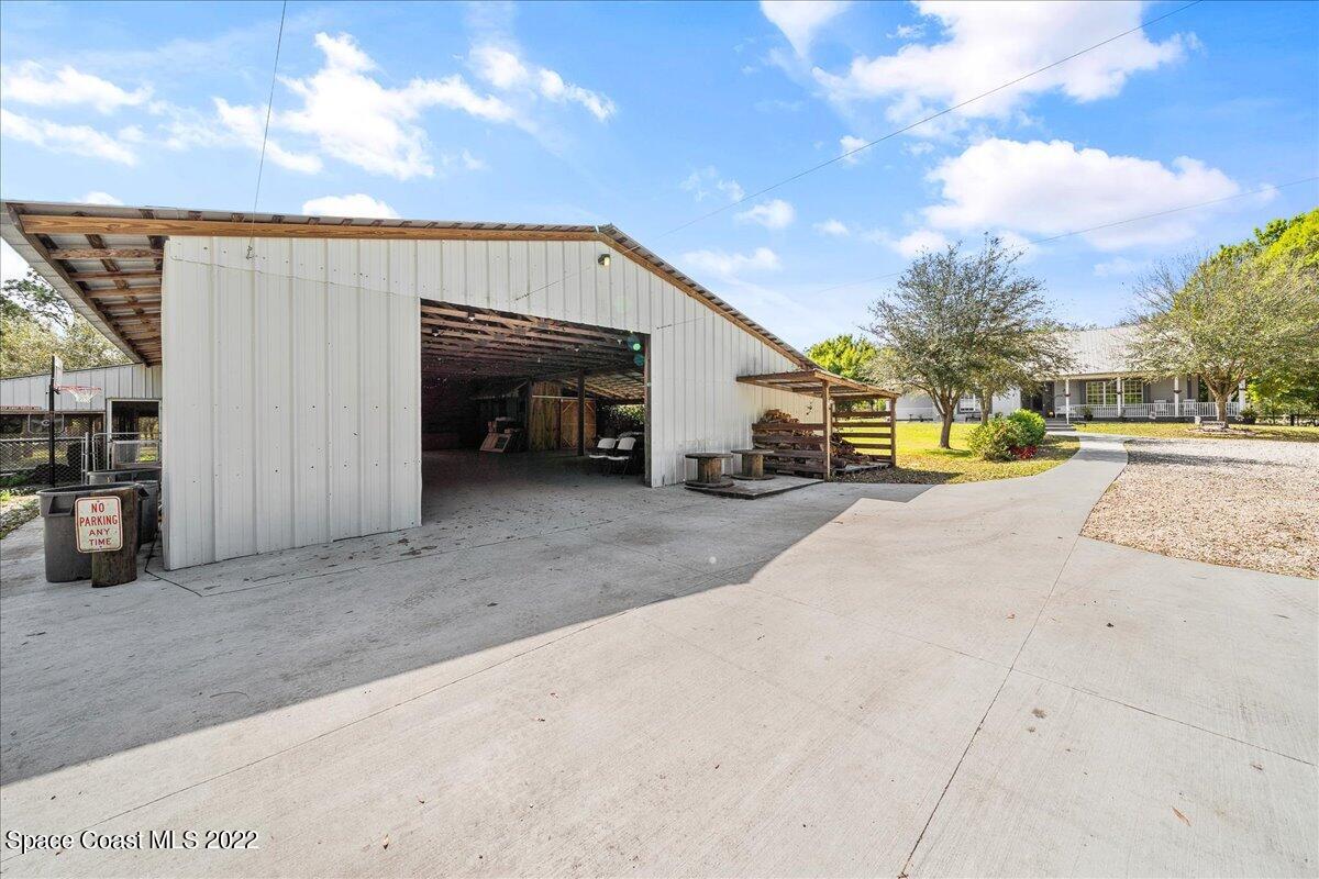 4450 Rayburn Road Cocoa, FL 32926 - Photo 33 of 45 a view of the parking area