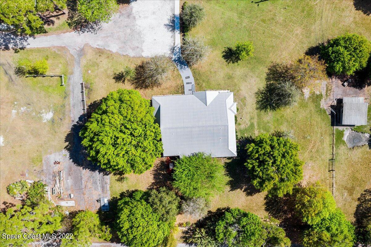 4450 Rayburn Road Cocoa, FL 32926 - Photo 41 of 45 an aerial view of a residential houses with yard