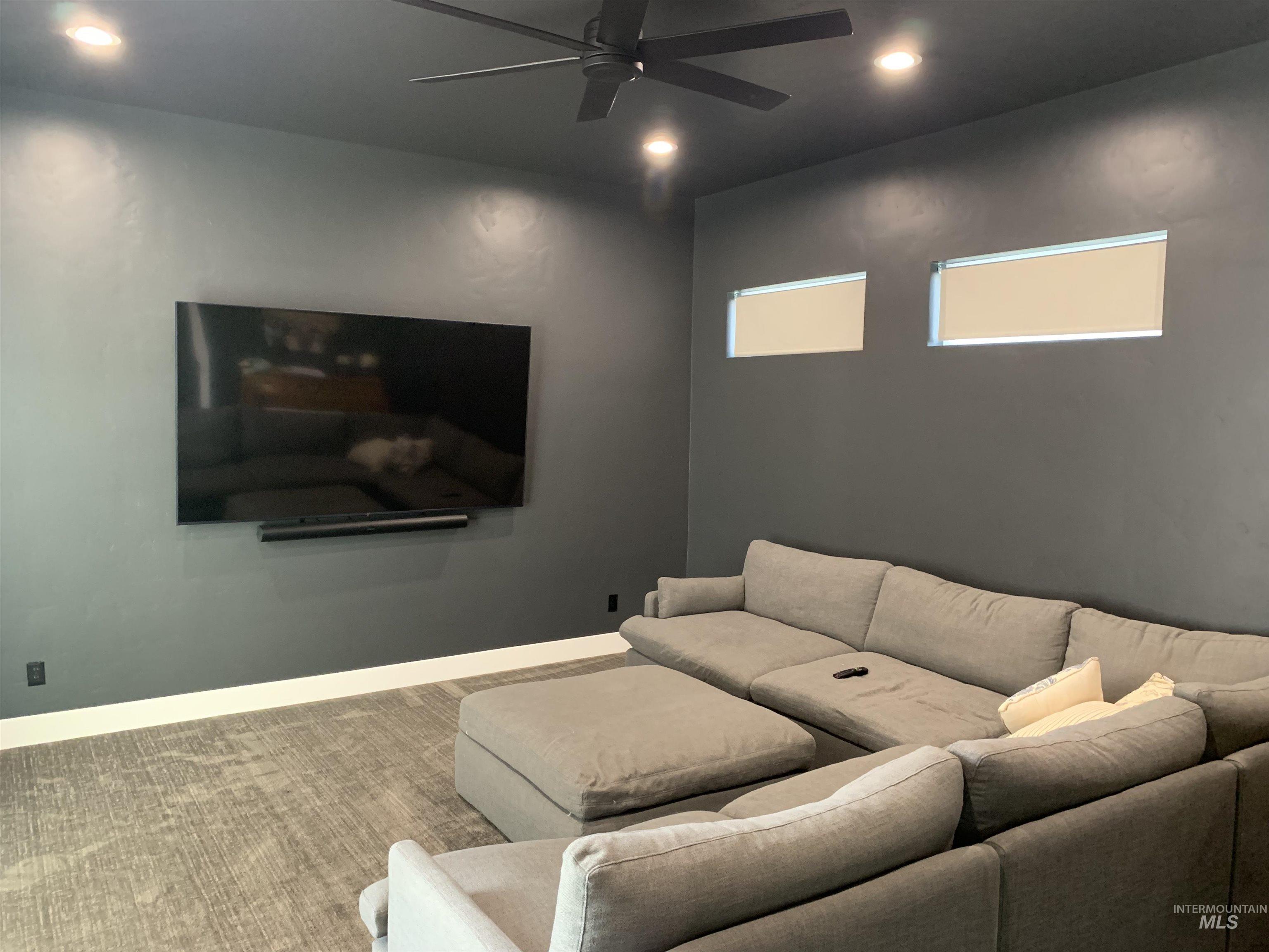 24501 Himark Way Caldwell, ID 83607 - Photo 23 of 27 Home theater room with recessed lighting, a ceiling fan, and carpet