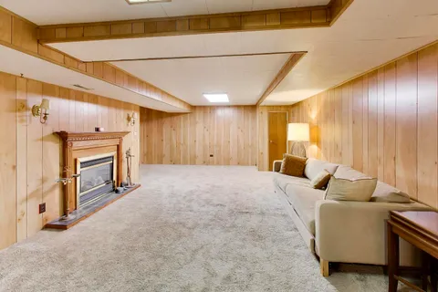 a spacious bedroom with a bed and furniture