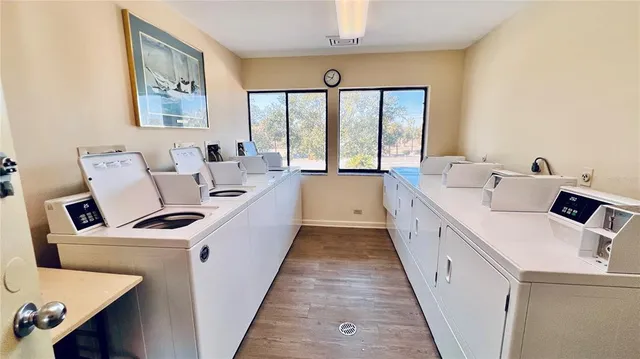 a view of a house with large tree