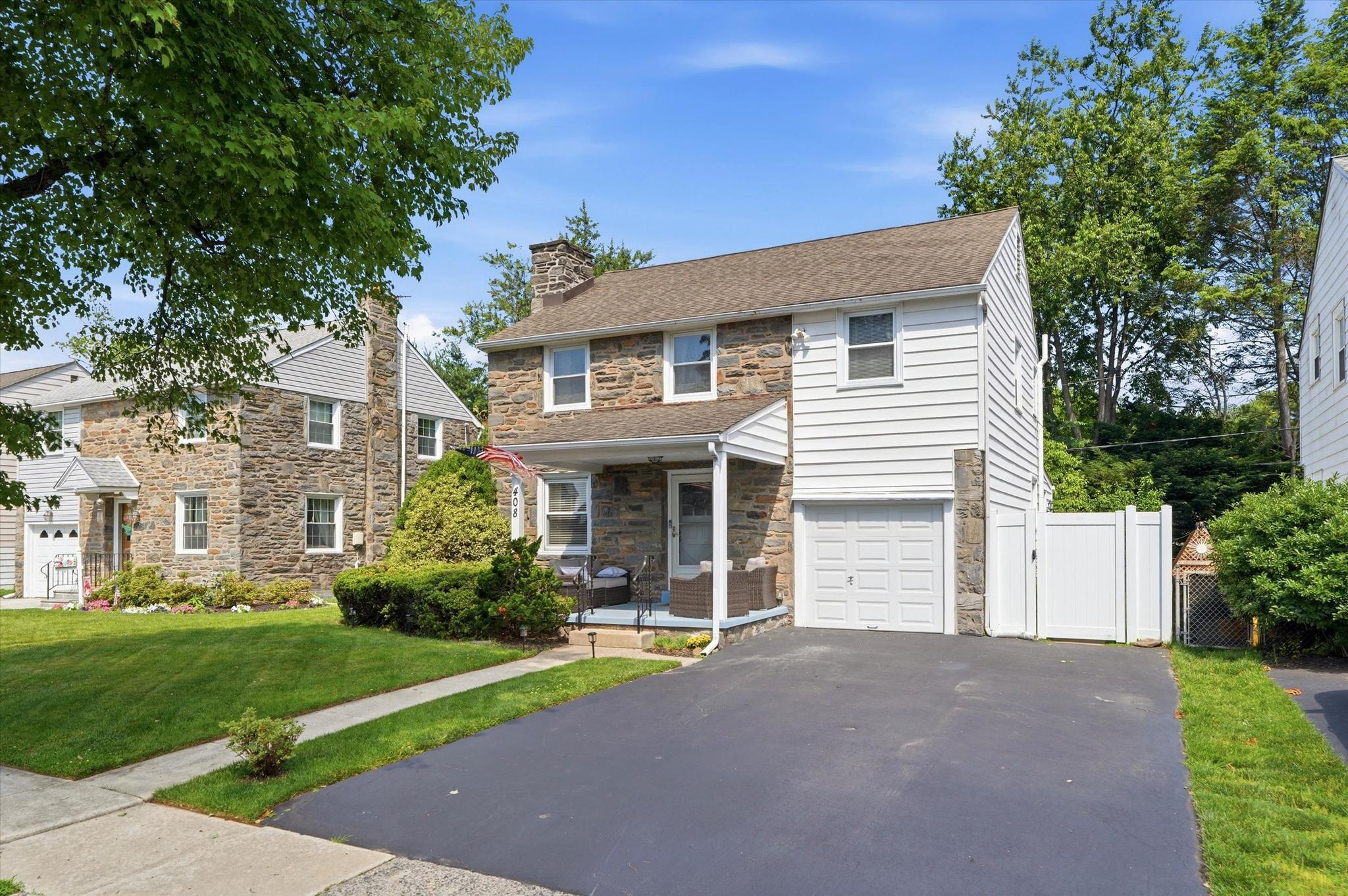 408 Maplewood Road Springfield, PA 19064 - Photo 2 of 24 View of front with garage and driveway (4 cars)