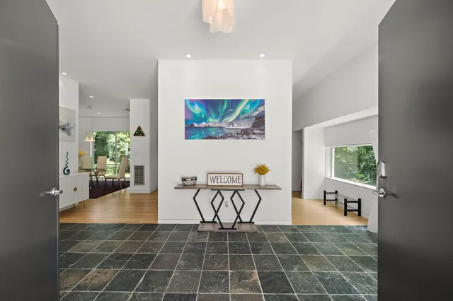 a view of an entryway of a house and front door