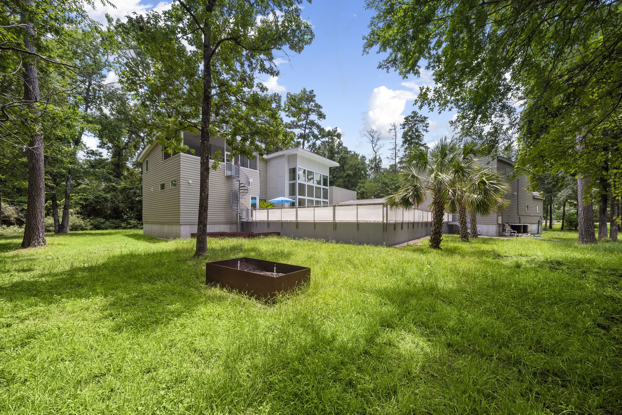 118 Angel Leaf Road Spring, TX 77380 - Photo 48 of 50 Grassy backyard area ideal for pets, play, or garden space.