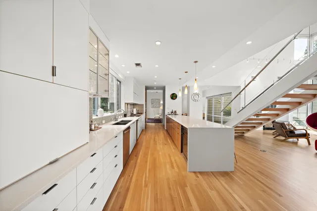 a view of living room with wooden floor