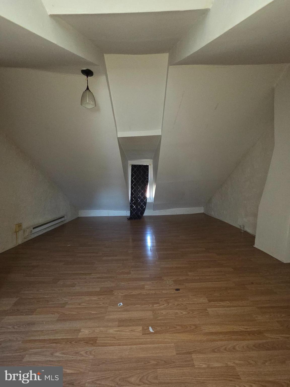 42 Maple Street Reading, PA 19602 - Photo 17 of 21 a view of empty room with wooden floor