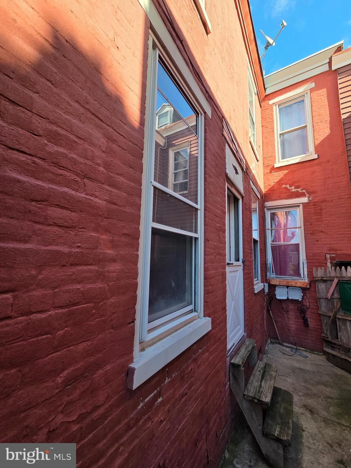 42 Maple Street Reading, PA 19602 - Photo 3 of 21 a front view of a house with a door