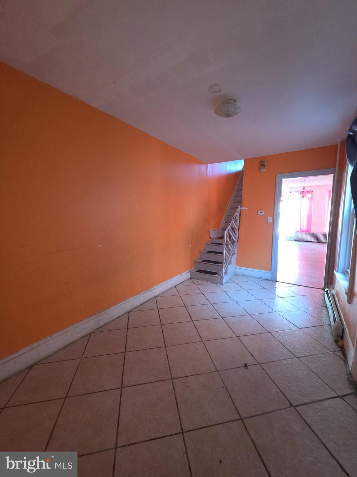 42 Maple Street Reading, PA 19602 - Photo 4 of 21 a view of an empty room with a window