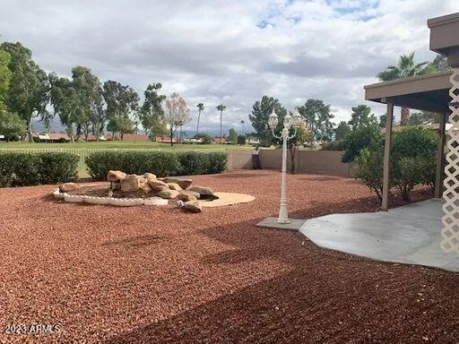 a view of a lake with a park