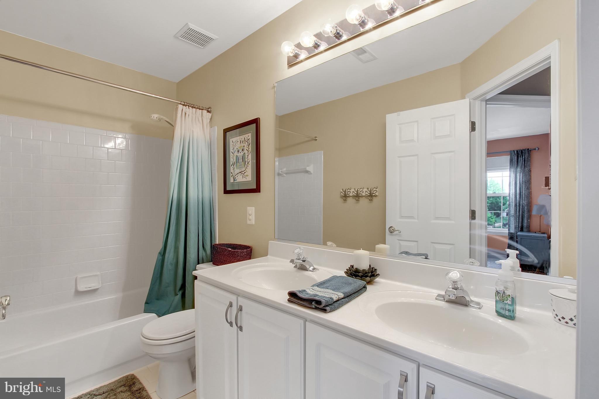 5056 Springhouse Circle Baltimore, MD 21236 - Photo 16 of 22 Hall Bath with Dual Vanities