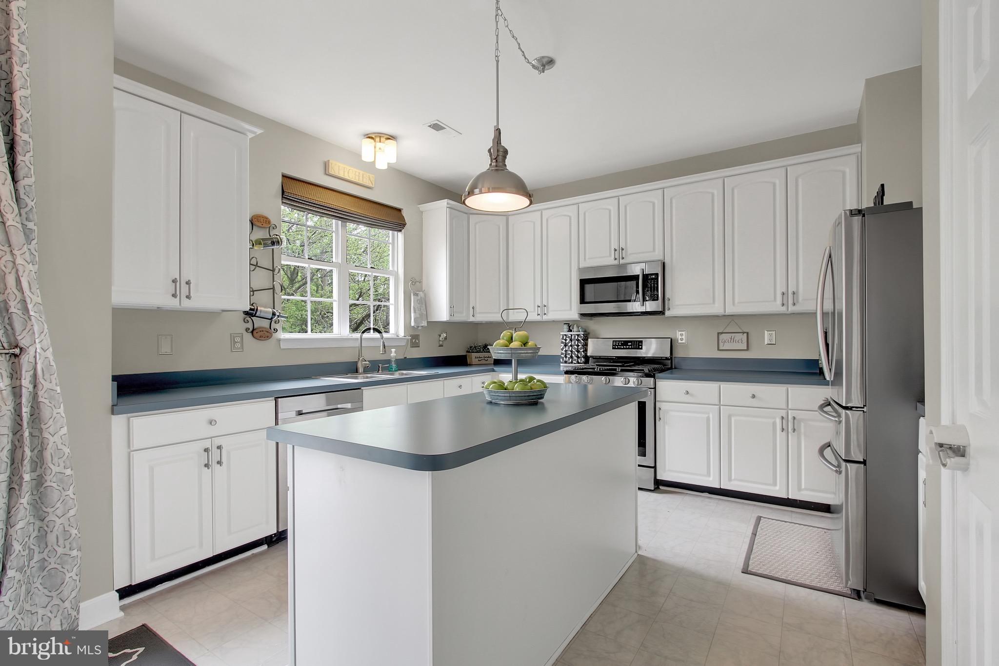 5056 Springhouse Circle Baltimore, MD 21236 - Photo 5 of 22 Gourmet Kitchen Featuring Stainless Appliances