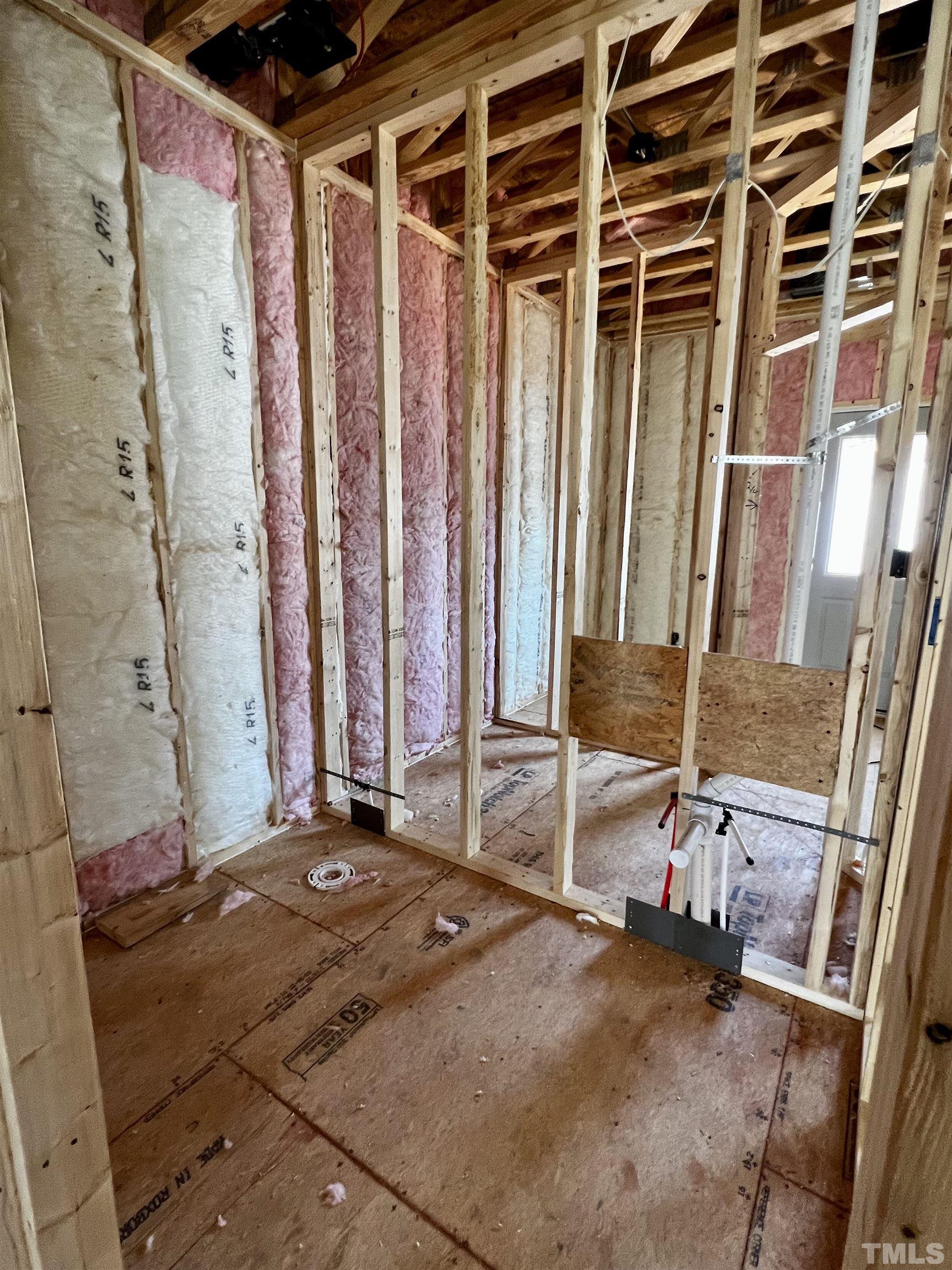 517 Friendship Chapel Road, Unit HVA0055 Wake Forest, NC 27587 - Photo 13 of 58 a bedroom with a bed and a mirror