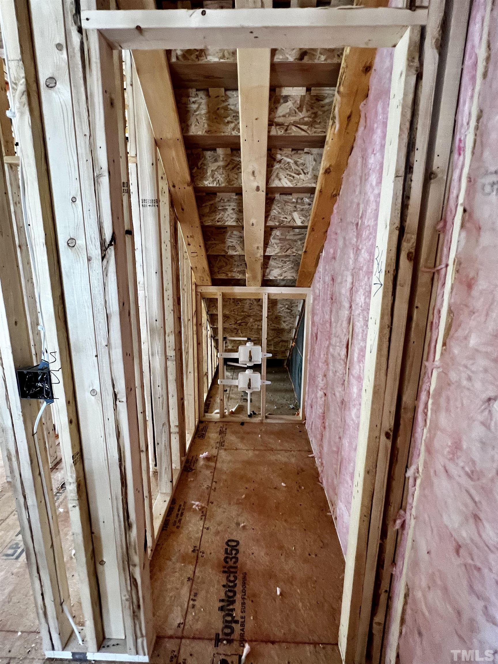 517 Friendship Chapel Road, Unit HVA0055 Wake Forest, NC 27587 - Photo 14 of 58 a view of a closet with wooden floor and stairs