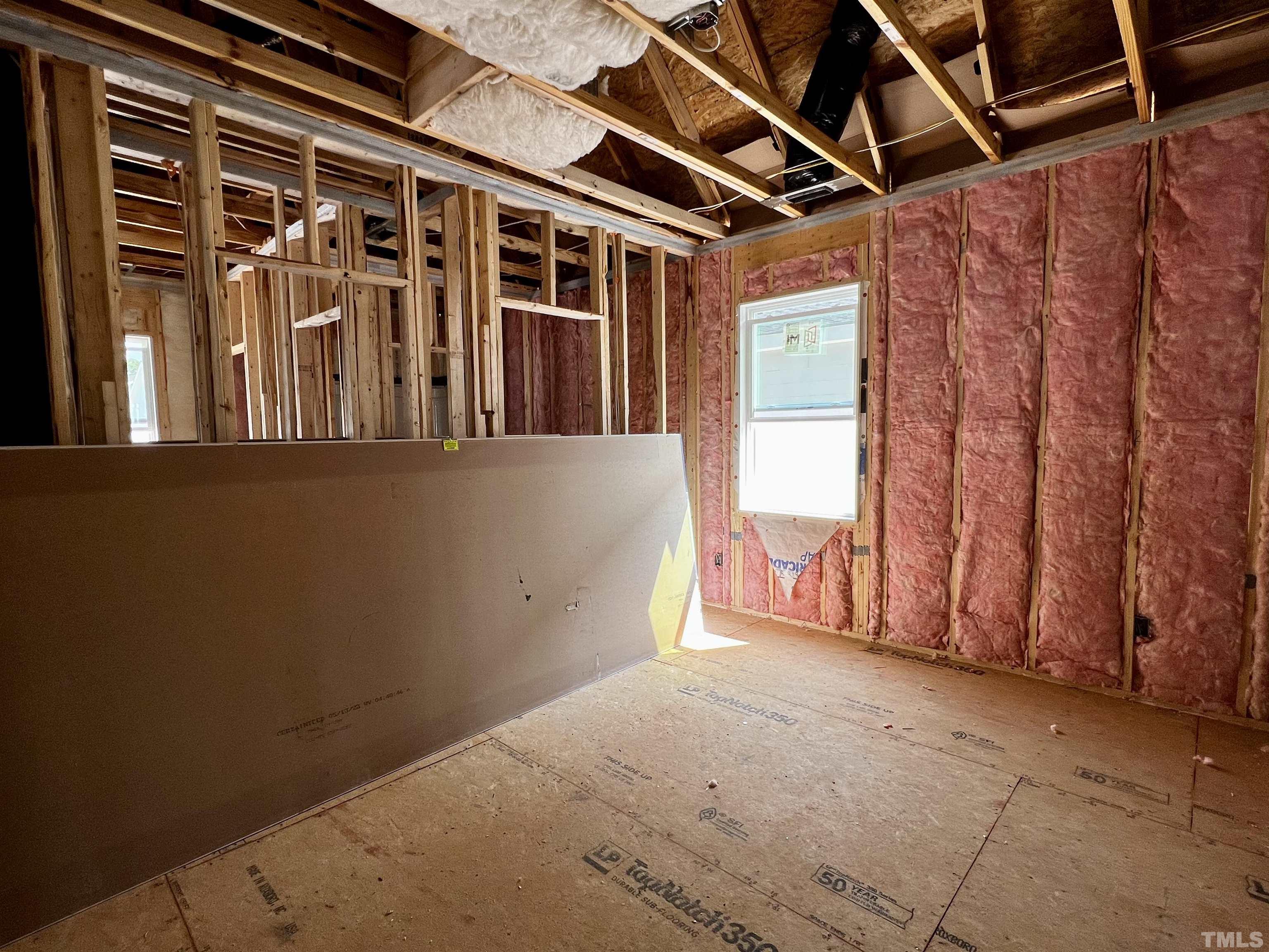517 Friendship Chapel Road, Unit HVA0055 Wake Forest, NC 27587 - Photo 20 of 58 a view of an empty room with a window