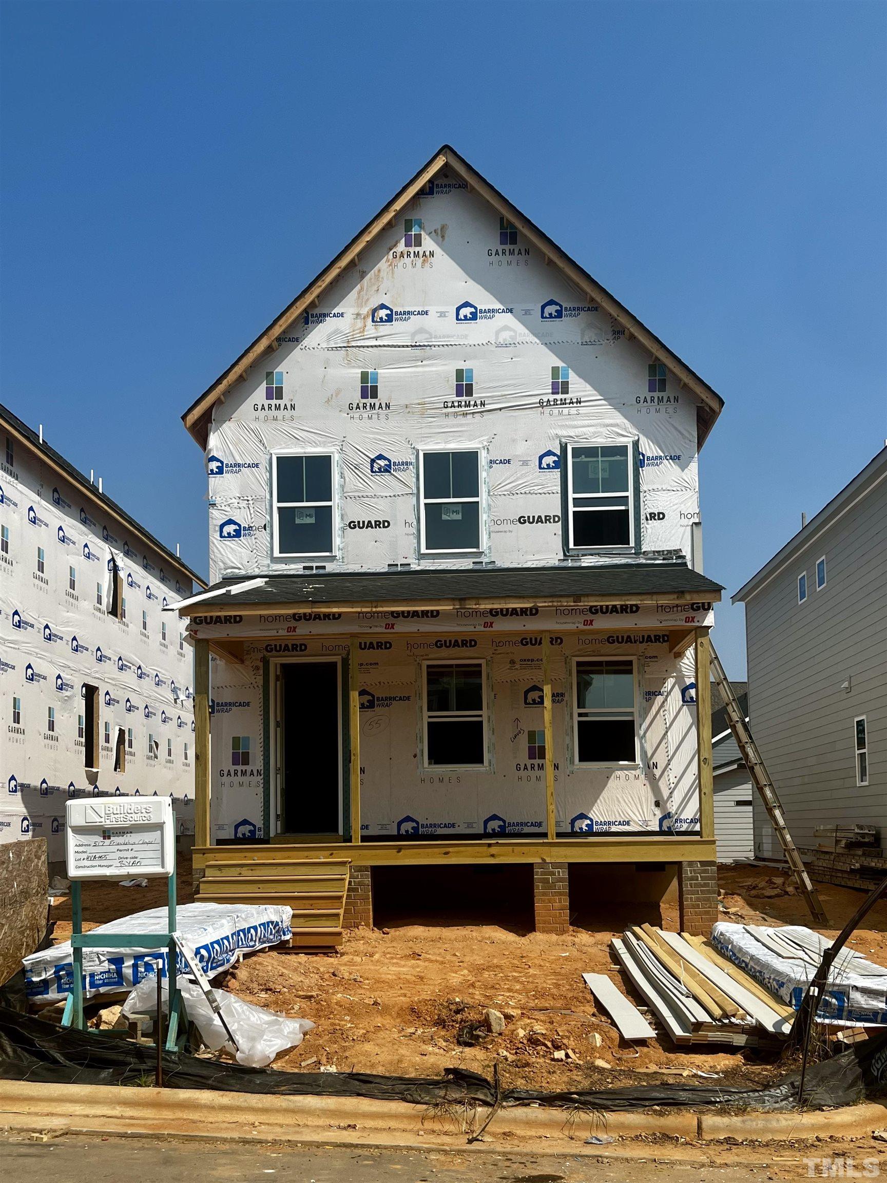 517 Friendship Chapel Road, Unit HVA0055 Wake Forest, NC 27587 - Photo 2 of 58 a front view of a house with garden