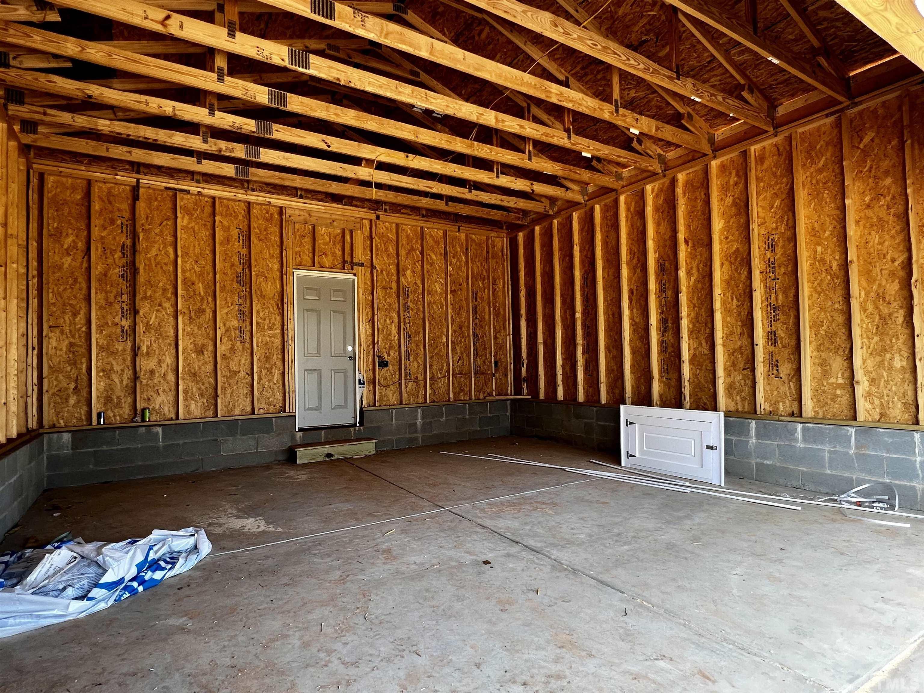 517 Friendship Chapel Road, Unit HVA0055 Wake Forest, NC 27587 - Photo 27 of 58 an empty room with windows