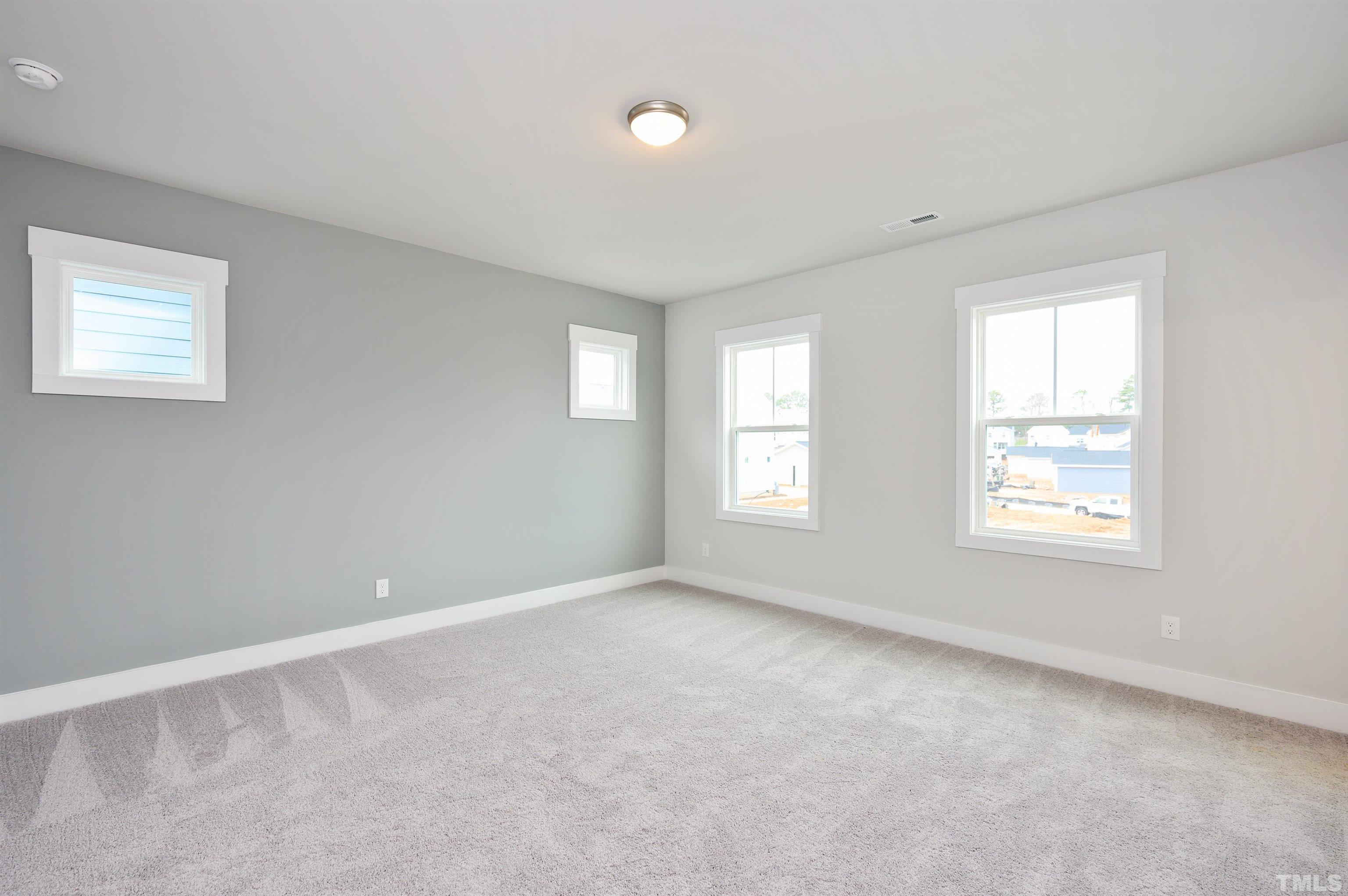 517 Friendship Chapel Road, Unit HVA0055 Wake Forest, NC 27587 - Photo 42 of 58 a view of an empty room with a window