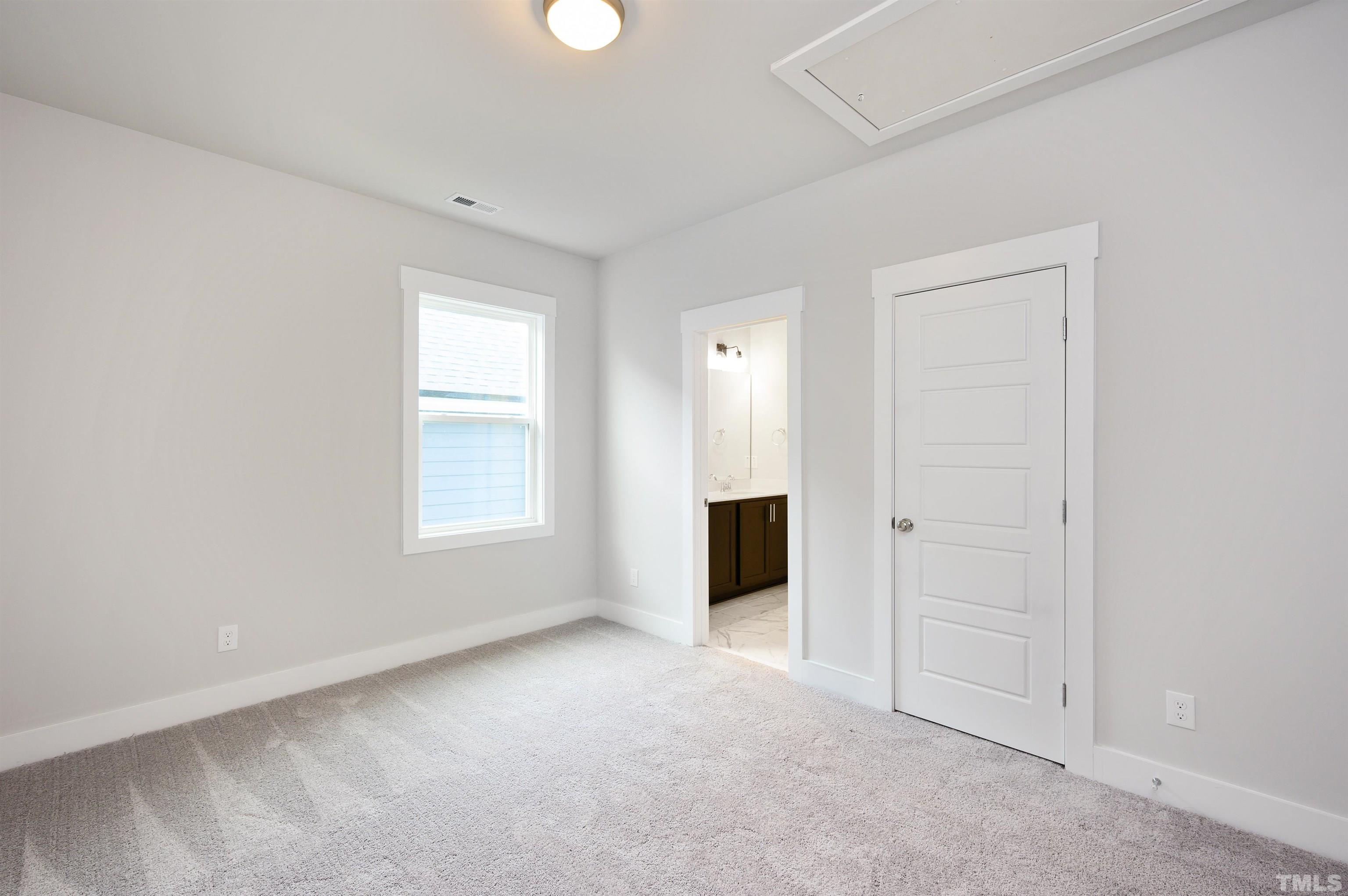 517 Friendship Chapel Road, Unit HVA0055 Wake Forest, NC 27587 - Photo 46 of 58 an empty room with windows and closet