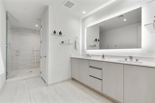 a bedroom with bed and window