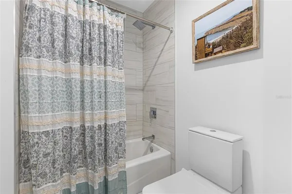 a view of swimming pool with patio