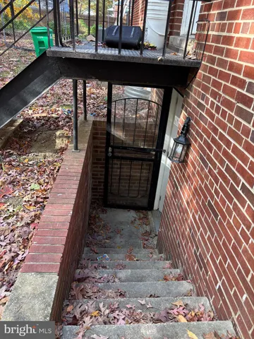 a view of a balcony with wooden floor