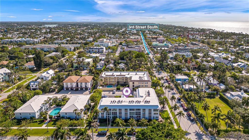 1021 3rd Street South, Unit 110 Naples, FL 34102 - Photo 27 of 30 an aerial view of a city with lots of residential buildings