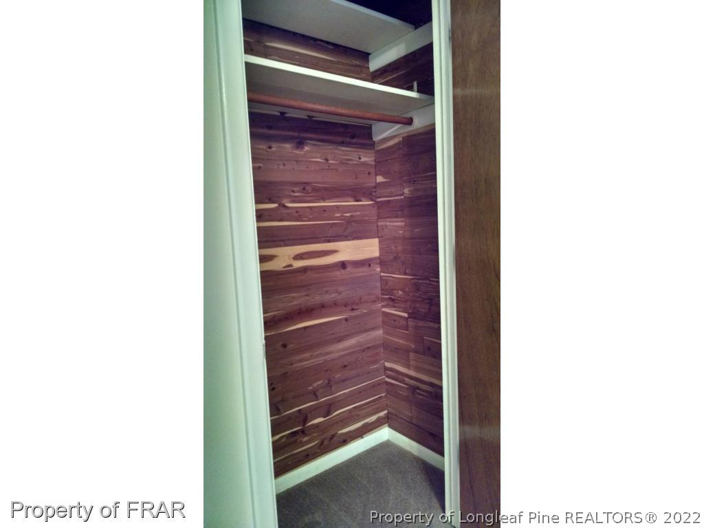 166 Boiling Spring Circle Southern Pines, NC 28387 - Photo 13 of 19 a view of a room with a door