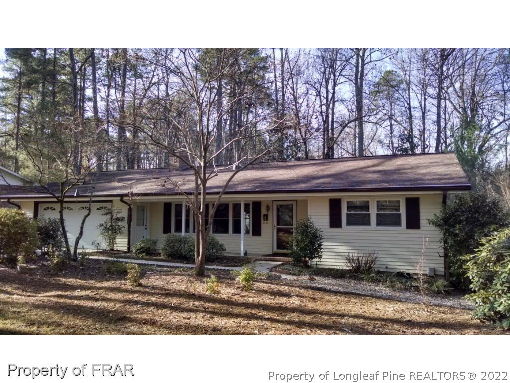166 Boiling Spring Circle Southern Pines, NC 28387 - Photo 19 of 19 a view of a house with a backyard