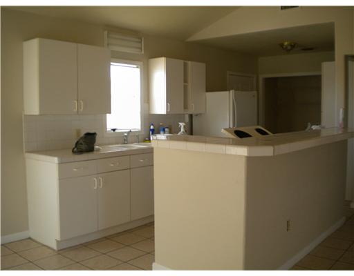 318 Jester Street Corpus Christi, TX 78418 - Photo 4 of 9 a room with sink washer and dryer