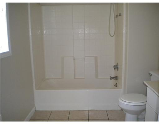 318 Jester Street Corpus Christi, TX 78418 - Photo 8 of 9 a bathroom with a toilet and a shower