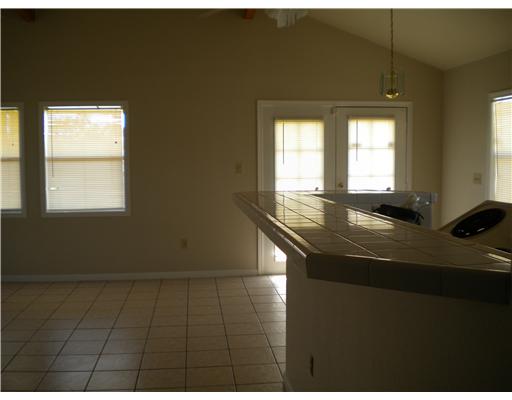 318 Jester Street Corpus Christi, TX 78418 - Photo 9 of 9 a kitchen with a sink cabinets and a window