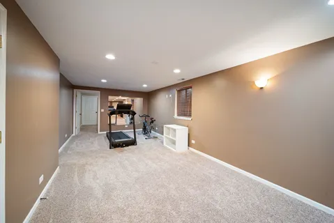 a room with furniture and a window