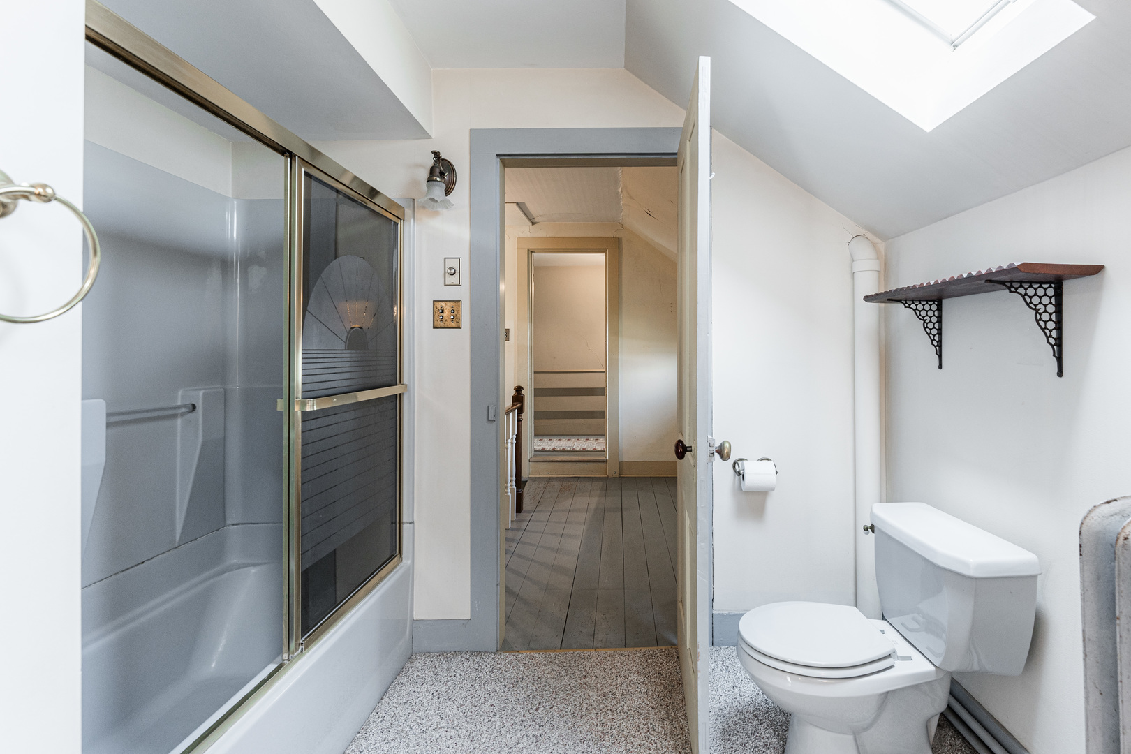 23659 Malta Road Malta, IL 60150 - Photo 31 of 111 a bathroom with a granite countertop toilet and a shower