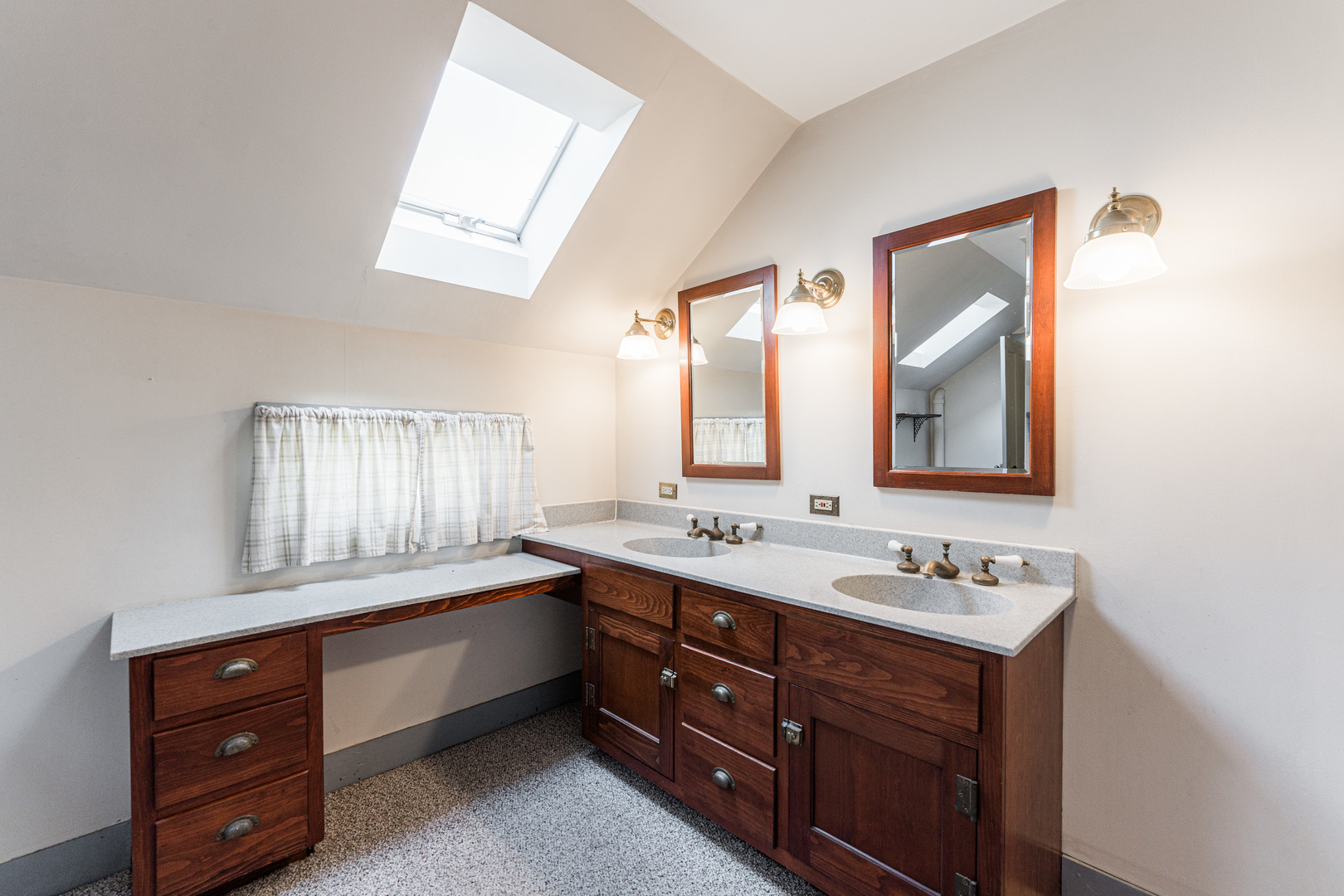 23659 Malta Road Malta, IL 60150 - Photo 32 of 111 a bathroom with a double vanity sink and mirror with window