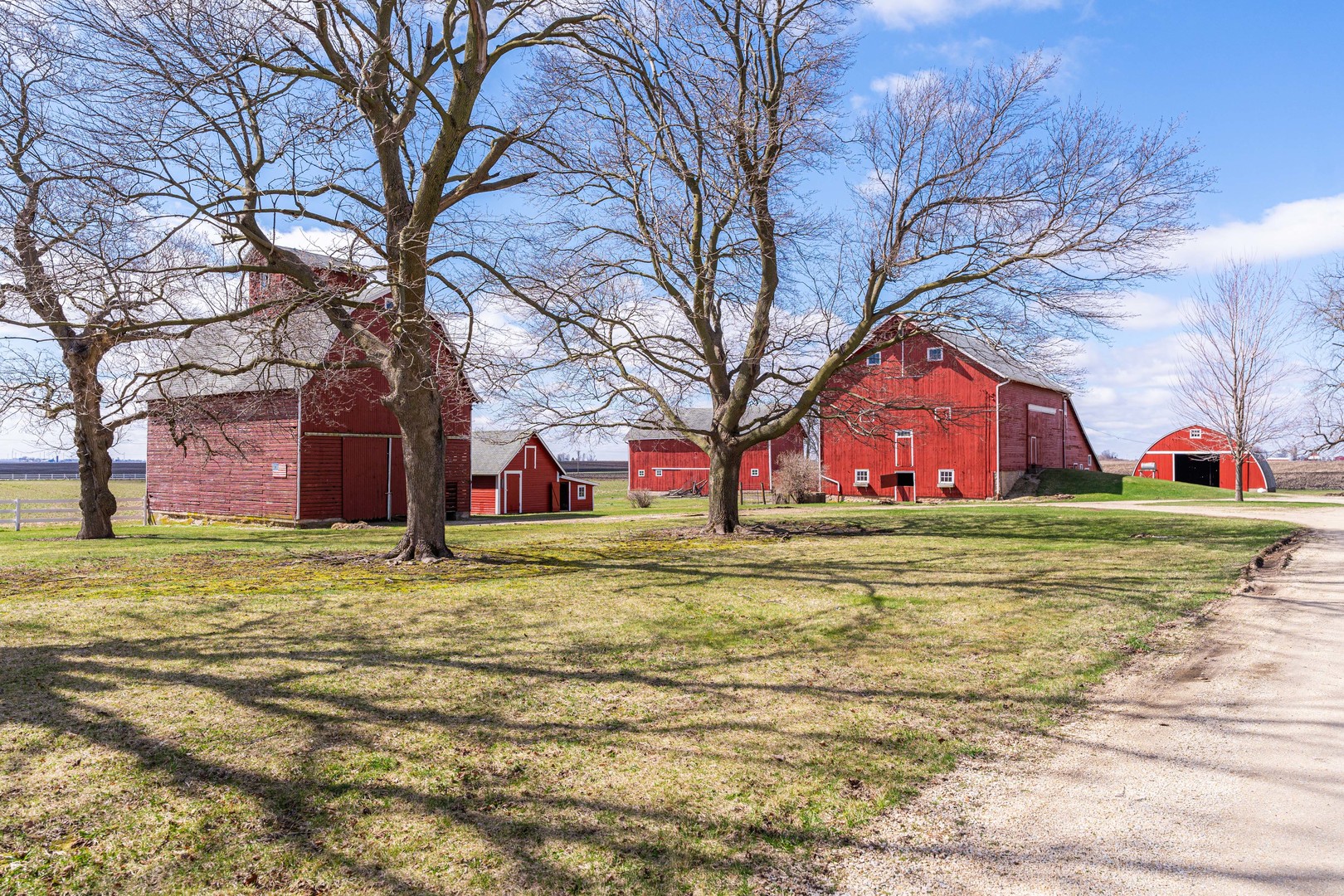 23659 Malta Road Malta, IL 60150 - Photo 38 of 111 a house with trees in front of it